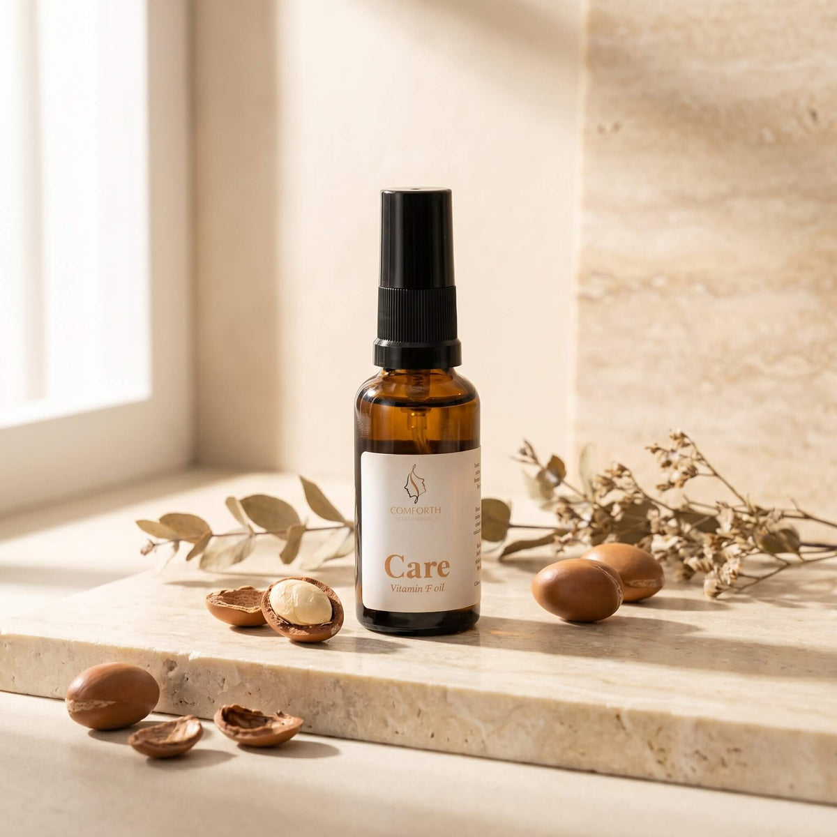 Comforth Care Vitamin F Oil ansigtsolie med nødder på stenhylde